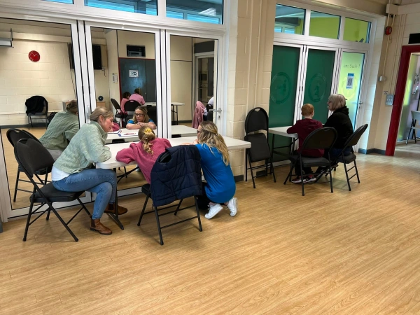 Two tables with parents and their children