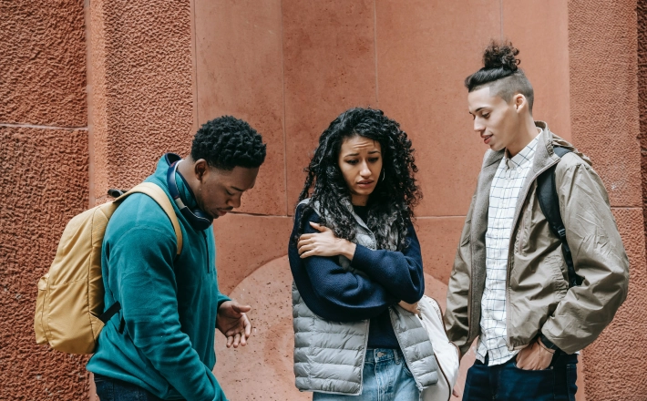 Lady in an intimidating situation with two men